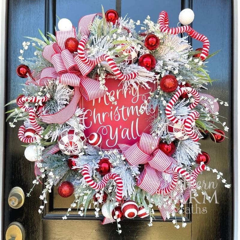 Flocked Holiday Wreath with Oversized Plaid Bow