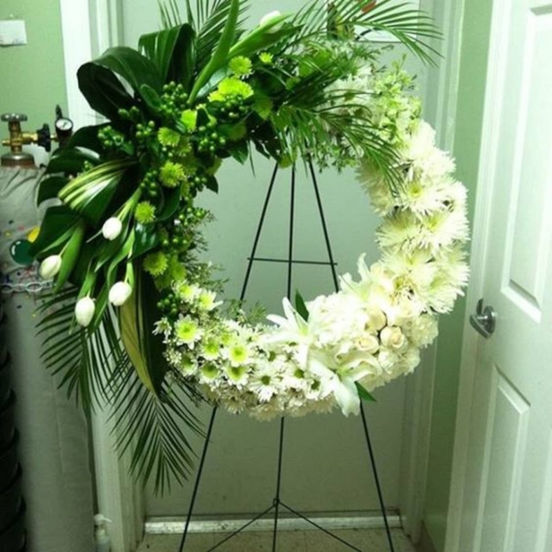 Floral Wreath: Mixed Blooms and Broad Leaf Greenery