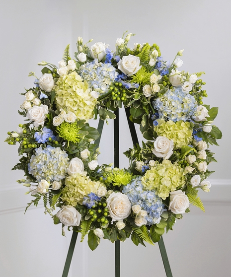 Floral Wreath with Blue Hydrangeas and Traditional Garden Style Blooms
