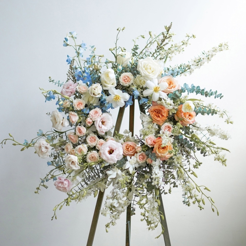 Floral Wreath with Soft Pastel Mixed Blooms and Dark Centers