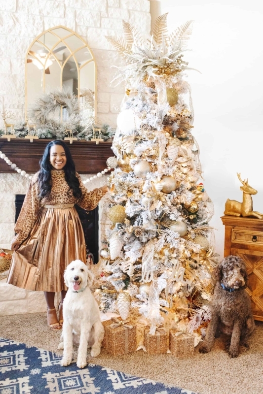 Glam White Christmas Tree Styling with Heavily Flocked Branches and Silver Ornaments