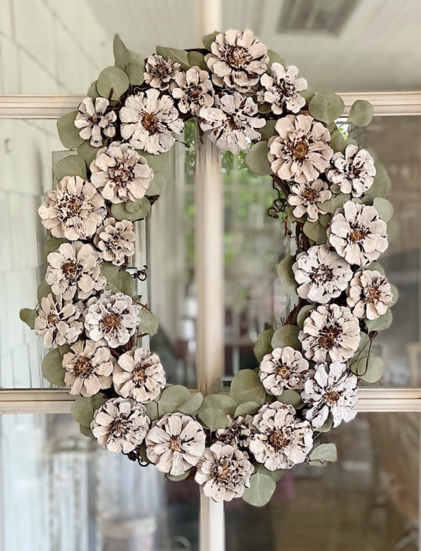 Layered Pine Cone Wreath on Charcoal Grey Door Textured Entryway