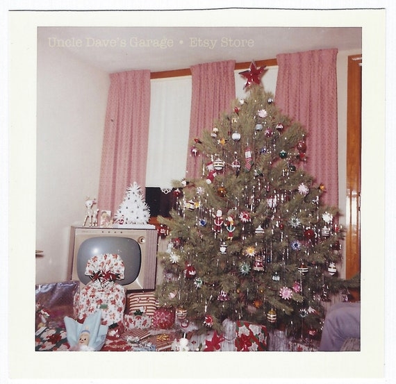 Mid-Century Modern Christmas Tree heavily decorated with Silver Tinsel