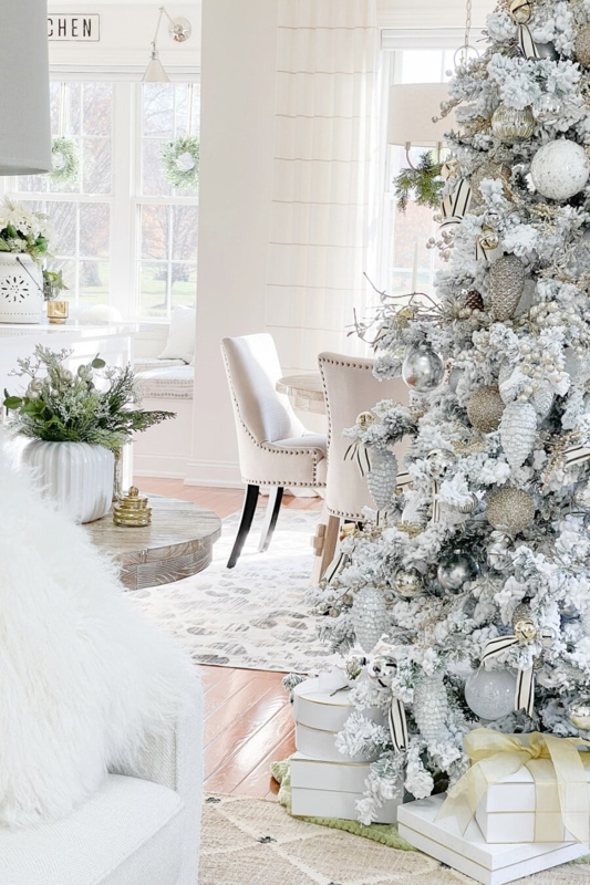 Modern Farmhouse Christmas Living Room with Arched Mirror over Mantel