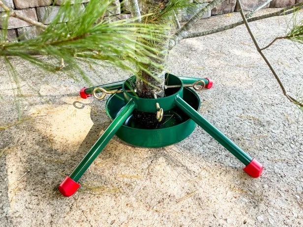 Modern Sage Green Christmas Tree Stand with Minimalist Silhouette