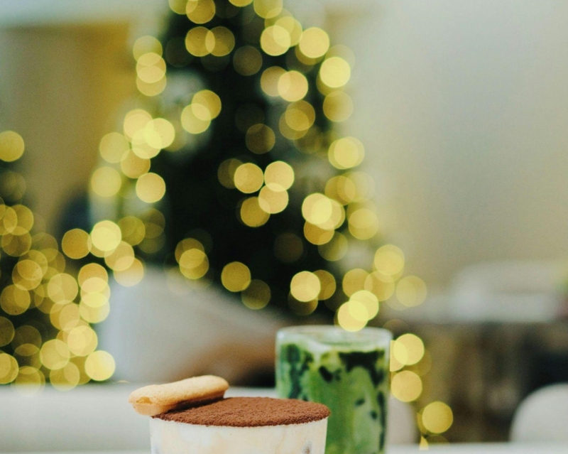Navy Velvet Chairs Flank Traditional Christmas Tree & Fireplace