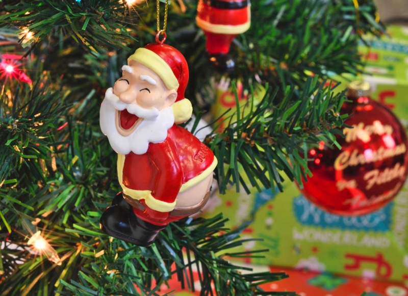 Novelty Santa Ornament Mooning Pose Humorous Holiday Decor