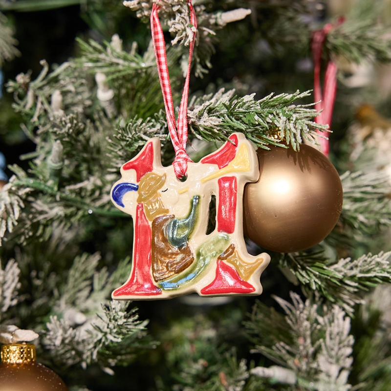 Ornament: Stoneware Relief Carved Piper, Blue and White Twelve Days Theme.