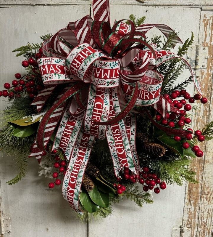 Oversized Layered Bow on Traditional Christmas Wreath