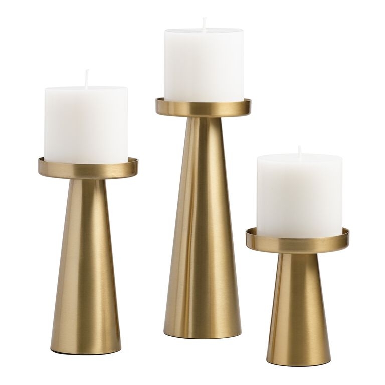 Pillar Candle Holder with Stepped Cylindrical Silhouette in Brushed Finish.