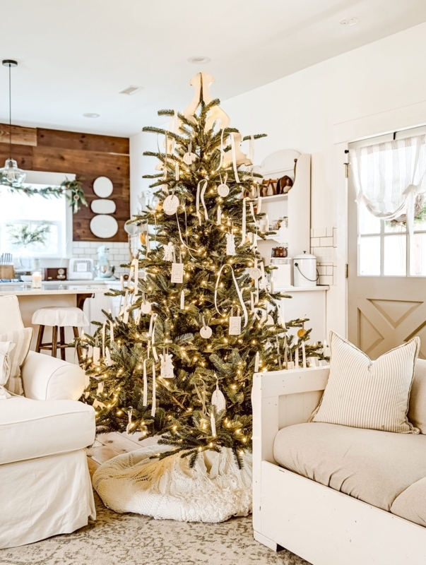 Pre-Lit Christmas Tree with Woven Rattan Collar in Cozy Setting