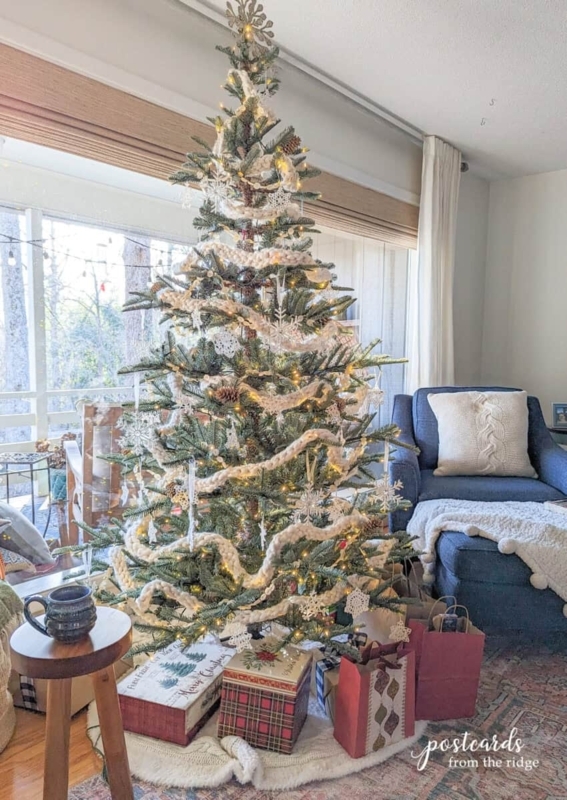 Pre-Lit Flocked Christmas Tree in Woven Basket Base for Farmhouse Decor