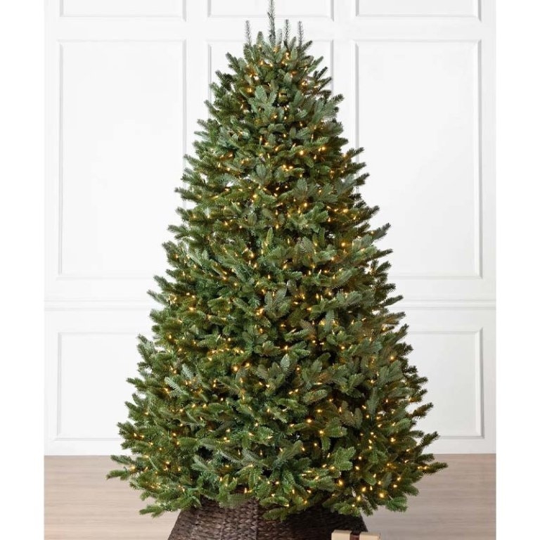 Realistic Artificial Christmas Tree with Conical Silhouette and Pre-Lit Glow