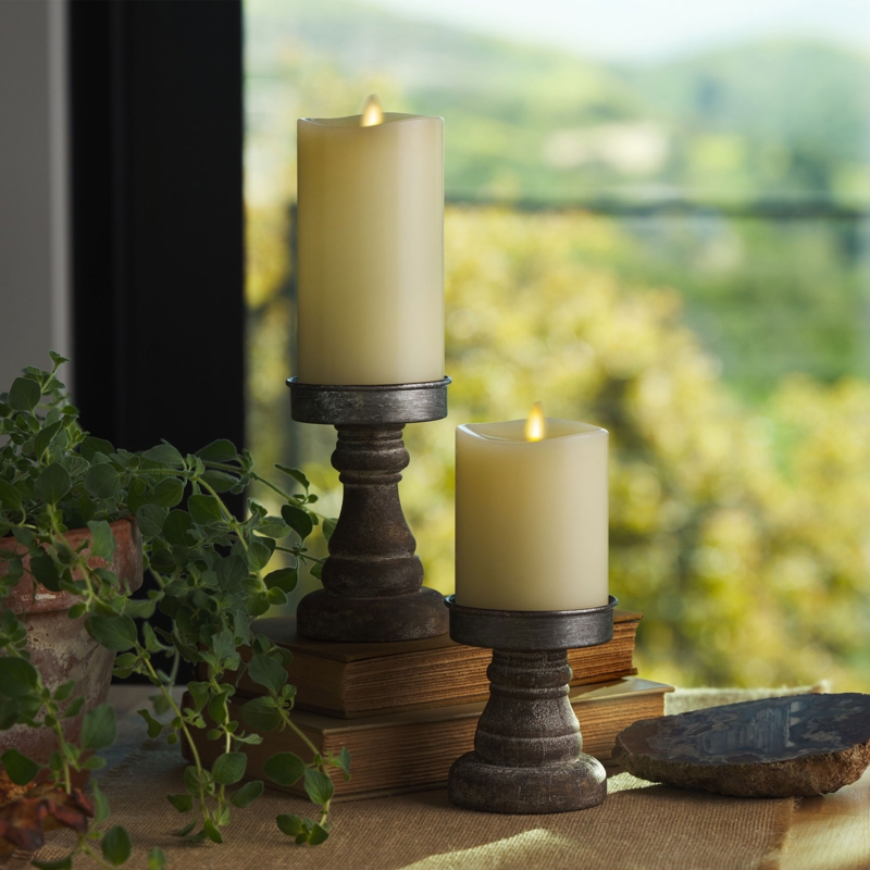 Realistic Moving Flame Pillar Candle on Distressed Pedestal and Books