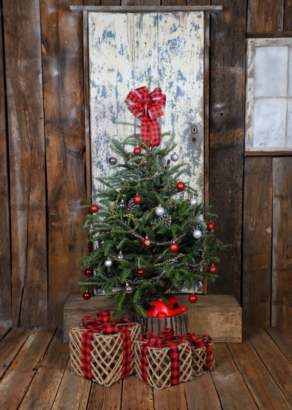 Rustic Tabletop Christmas Tree with Mantel Backdrop in Cozy Living Room