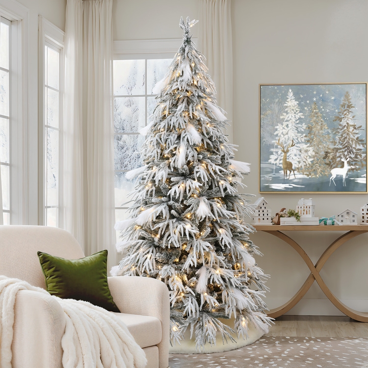 Rustic Woven Basket Base on a Slender Flocked Christmas Tree