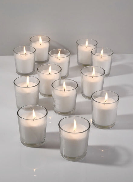 Set of White Votive Candles in Clear Glass Holders on Reflective Base