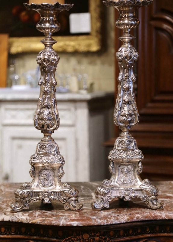 Silver Repousse Candlestick Pair with Ornate Carving and Triangular Base