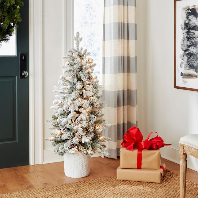 Slim Flocked Artificial Christmas Tree in Traditional Urn Base