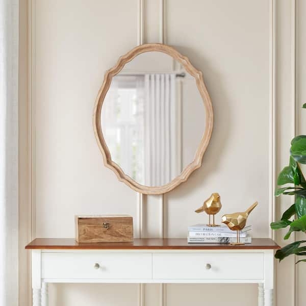 Wall Mirror: Natural Wood Oval Silhouette with Floral Crest