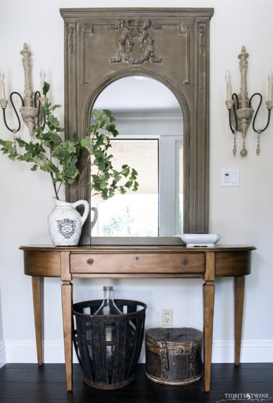 Wall Mirror: Rustic Trumeau Style with Symmetrical Sconces