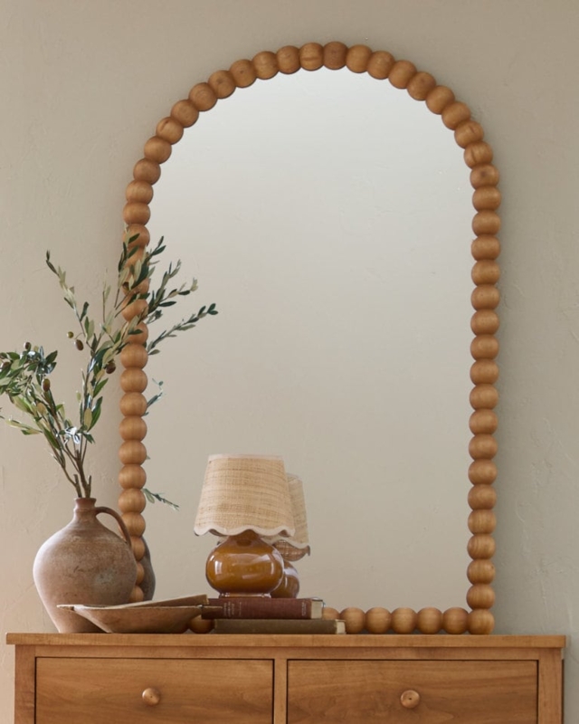 Wall Mirror with Arched Bobbin Frame and Spherical Wood Accents decor