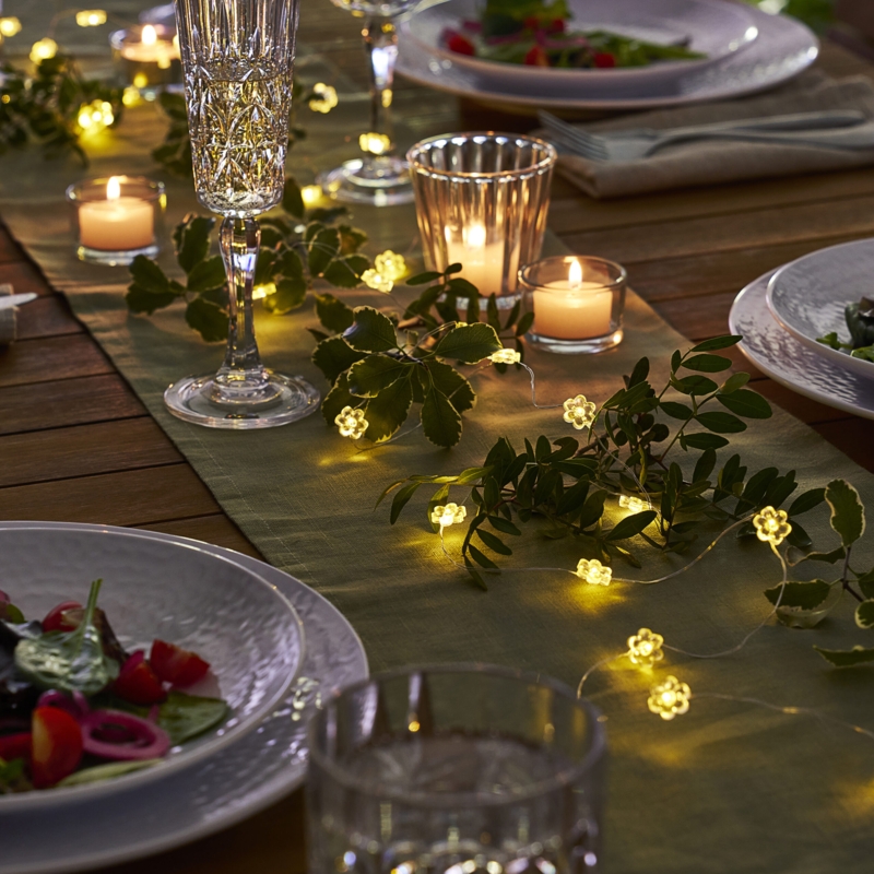 Whimsical Floral String Light Decor: Flower Petal Covers in Glass
