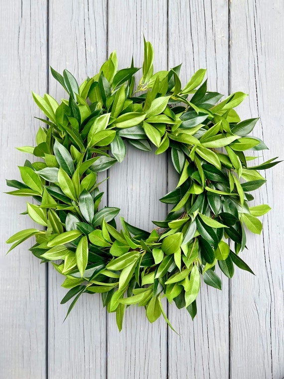 Wreath with Dense Laurel Foliage, Modern Farmhouse Style on Dark Door.