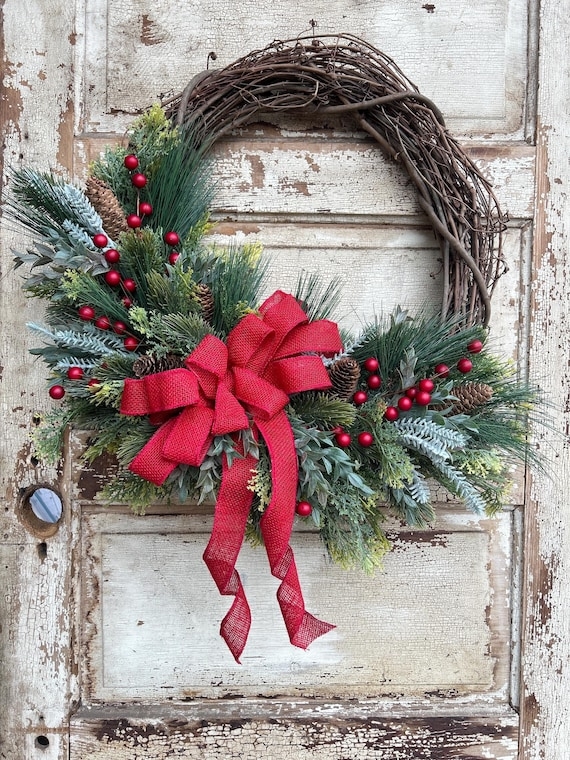 Wreath with Red Burlap Bow and Pinecone Accents