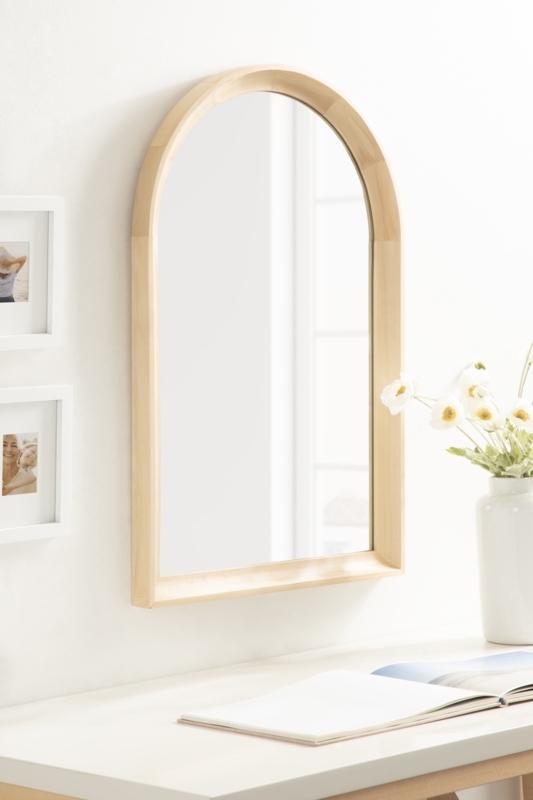 Arched Mirror in light natural wood for transitional styling.