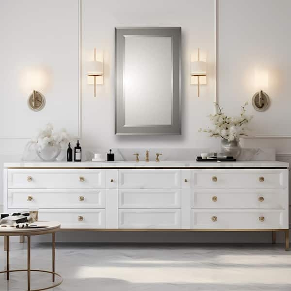 Bathroom Medicine Cabinet with white recessed paneling frame.