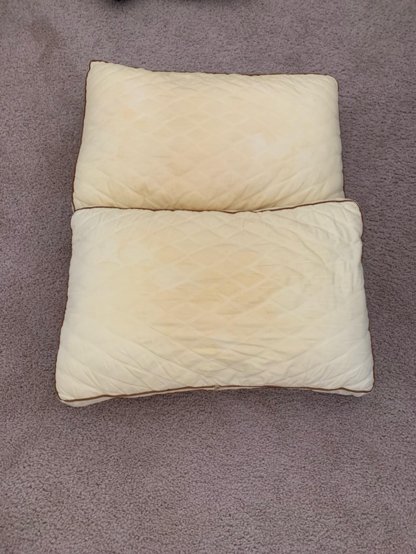 Bed Pillow showing Stained Fabric for Hygiene and Maintenance