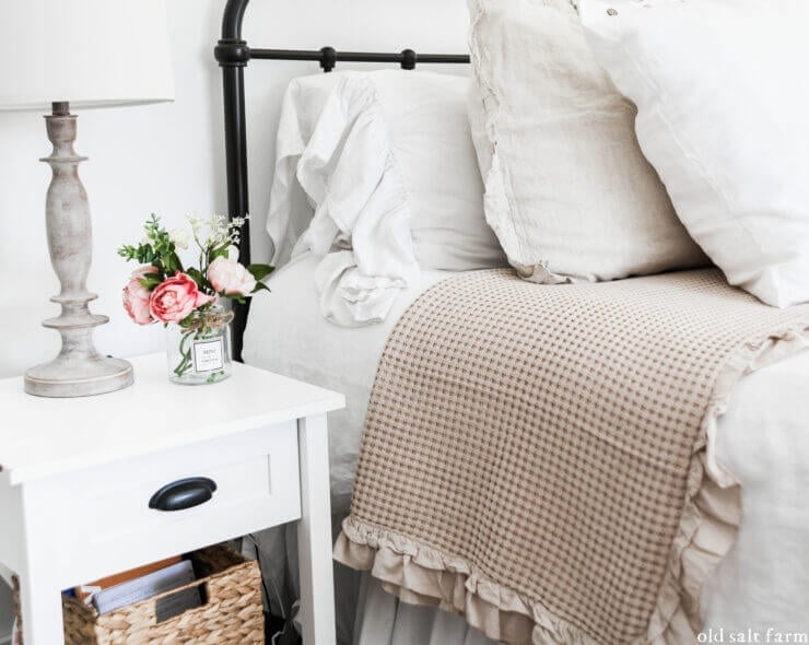 Bed with Pom Pom Accent Pillow: White and Cream Farmhouse Bedding Layers