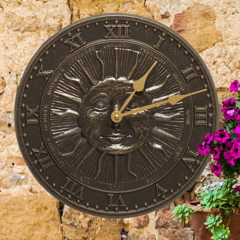Celestial Wall Clock Sun Face Motif Weathered Bronze