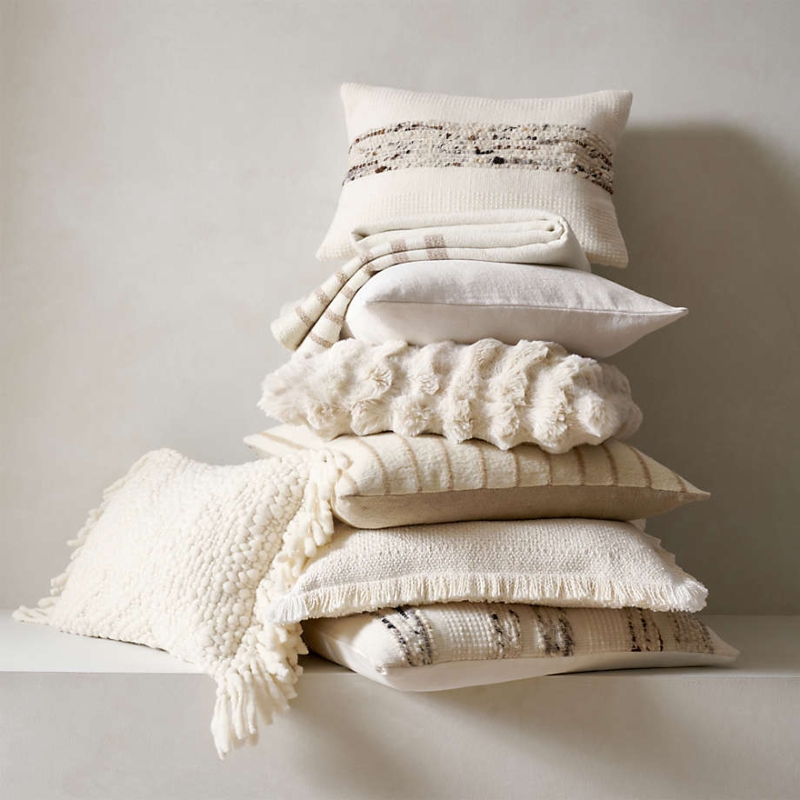 Chunky Woven Throw Pillow Stack with Long Fringe Detail