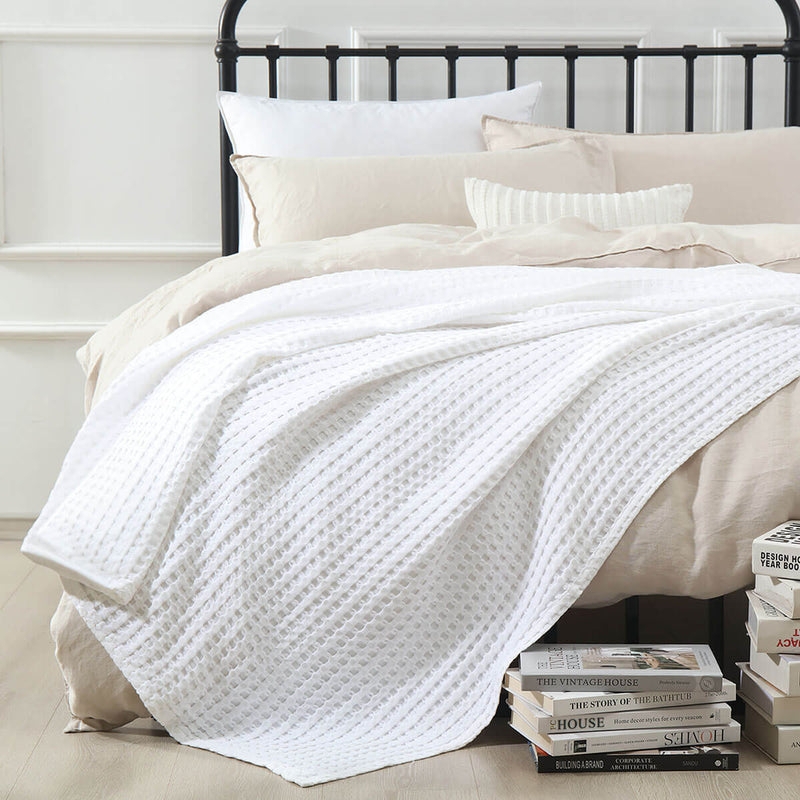 Crisp White Waffle Blanket with Folded Drape for Luxury Bedding