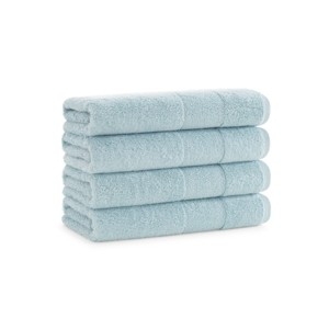 Hand Towels in Sterling Blue Displayed in Woven Rattan Tray