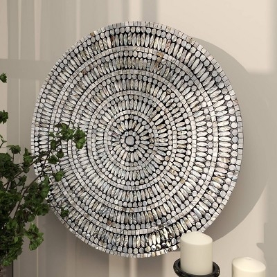 Metal Starburst Wall Decor with Radiating Spokes and Central Sphere