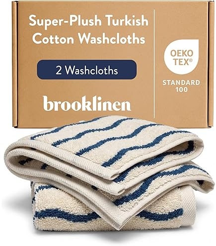 Navy Striped Plush Hand Towels Styled on Shelf, Modern Spa Decor