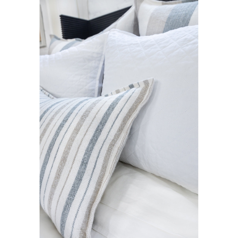 Ocean Blue Throw Pillow with Stripe Pattern and Frayed Edges.