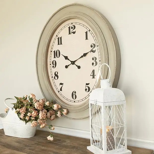 Oval Wall Clock with Rustic Heavily Distressed Finish