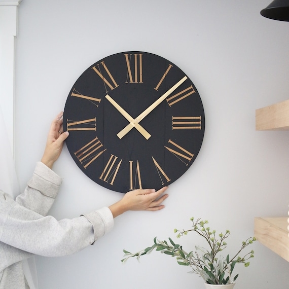 Oversized Wall Clock Black and Gold Palette Open Back Roman Numerals