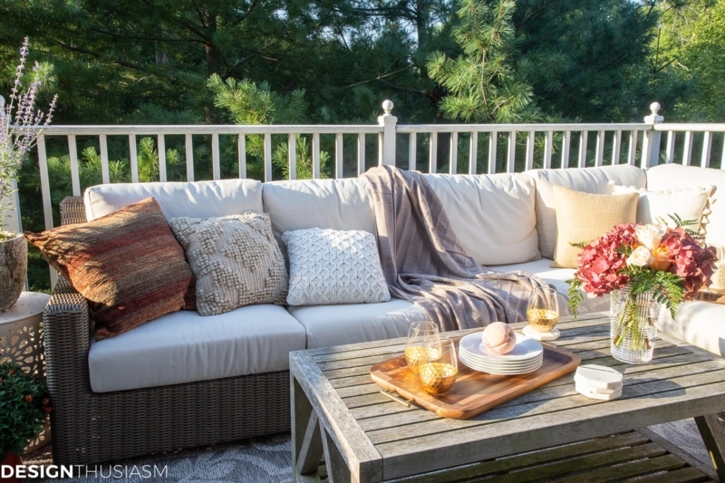 Patio Chairs with Whitewashed Woven Finish near Stone Fireplace