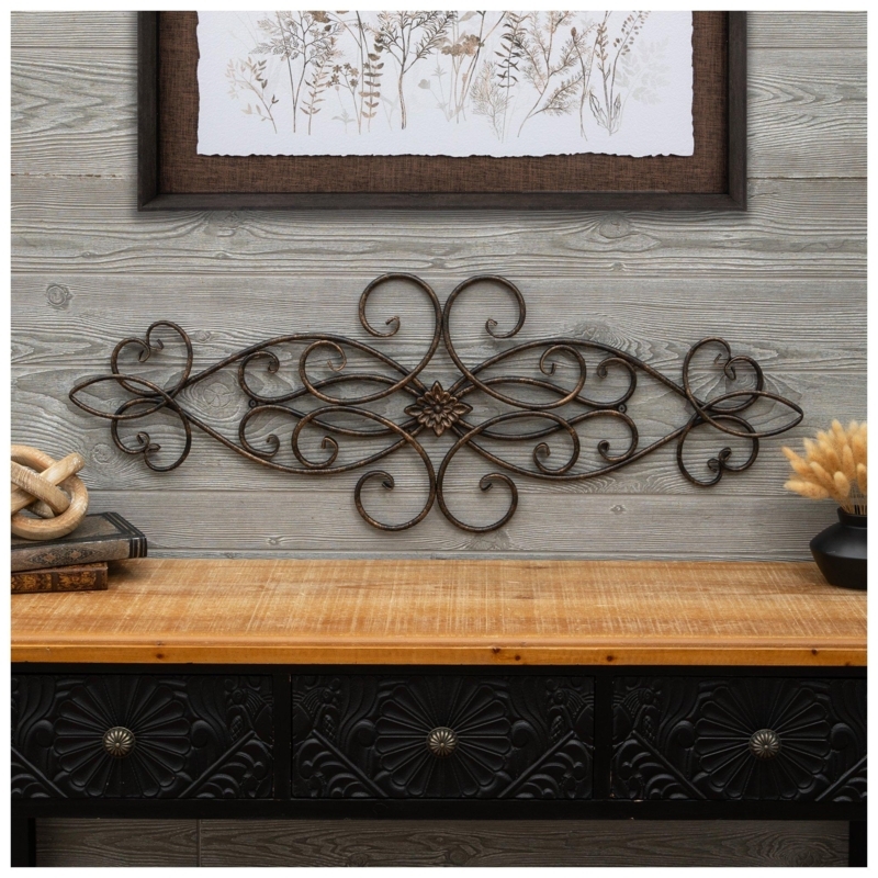 Round Black Metal Wall Art: Radial Scrollwork with Central Medallion.