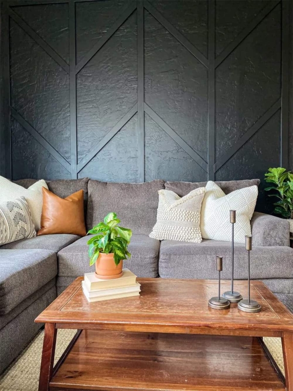 Sectional Sofa in Moody Living Room with Black Geometric Slat Wall