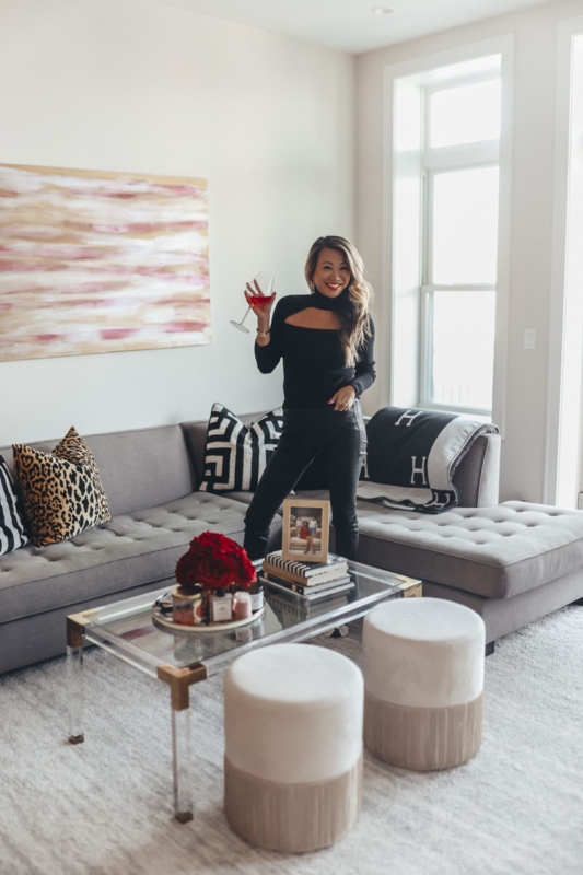Sofa: Dark Gray Upholstered with Layered Textural Pillows