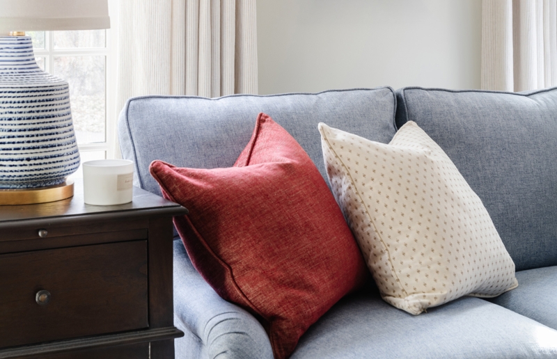 Sofa Neutral Pillow Styling Ideas using Symmetrical Layering