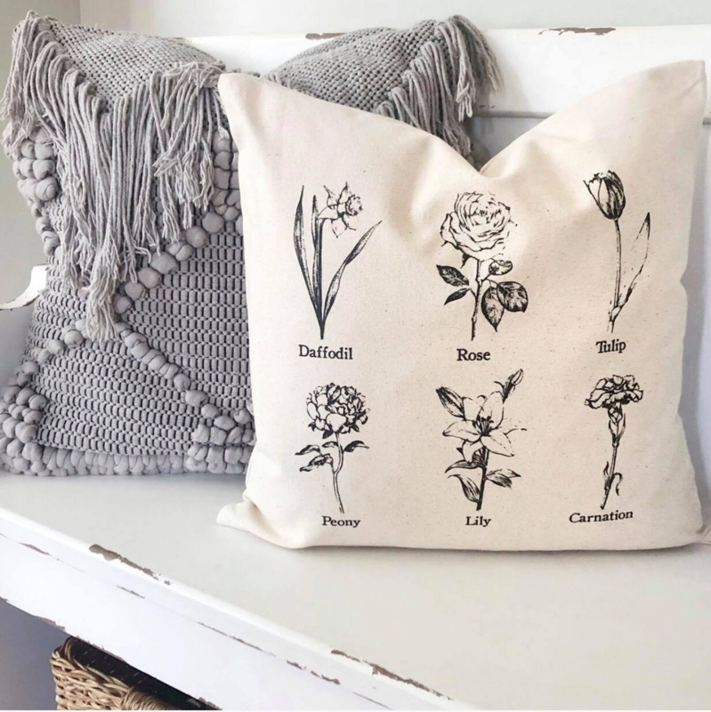 Square Throw Pillow with Botanical Embroidery and Corner Pom-Poms
