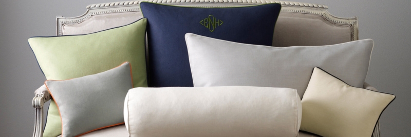 Stacked Throw Pillows featuring Embroidered Accents for Coastal Decor