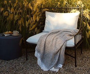 Throw Blanket for Modern Coastal Patio Styling with Crosshatch Weave